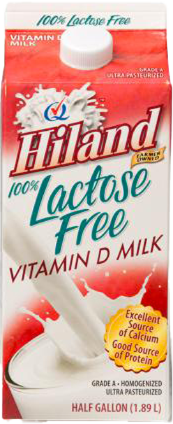 Lactose-free milk carton with pouring milk splash